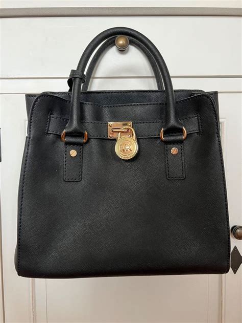 michael kors handtasche schwarz gold 2011